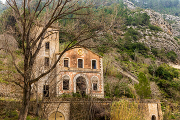 Old train track on the Serpis river with old construction in Villalonga.