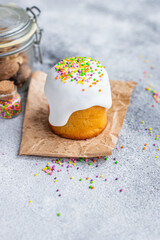 Easter cake panettone and Easter eggs festive table setting traditional treat. Happy easter holiday on the table meal snack top view copy space  food background rustic