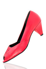 Red female shoes isolated on white. Women's shoes on high heels, close-up