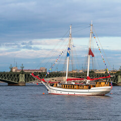 Obraz premium Saint Petersburg, Russia - July 13, 2019 - a group of old sailing ships docked on the Neva River