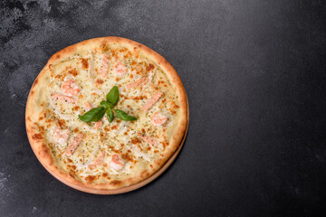Delicious fresh seafood oven pizza: red fish and shrimp