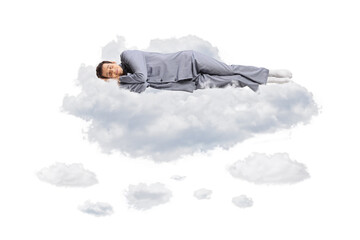 Young man in pajamas floating in the air and sleeping on clouds