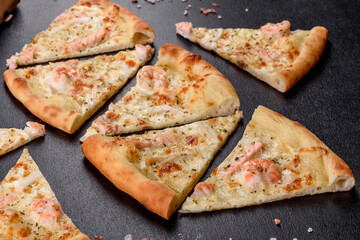 Delicious fresh seafood oven pizza: red fish and shrimp