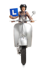 Elderly man riding a scooter and holding a learner plate