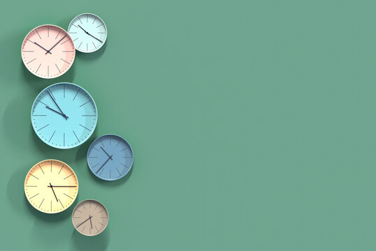 Simple multicolor wall clock with different time on a dark background.