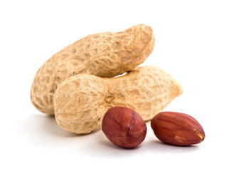 Dried peanuts on the white background.