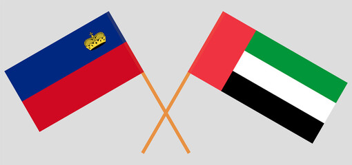 Crossed flags of Liechtenstein and the United Arab Emirates. Official colors. Correct proportion