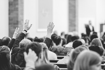 Black and white shot of people on the meeting