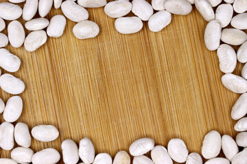 organic dried white beans on a background