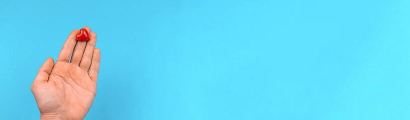 Donate and helping hand concept banner, world blood day background with copy space and man hand...