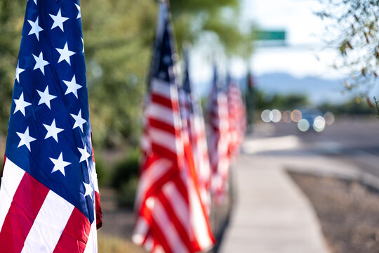 Row Of US Flags On A City Street