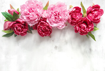 Pink peony flowers bouquet marble texture Floral background © LiliGraphie