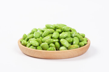 fresh green soybeans on white background.