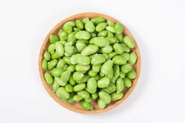 fresh green soybeans on white background.