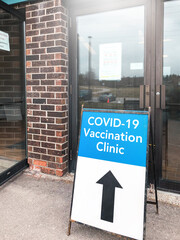 COVID-19 vaccination clinic directional sign