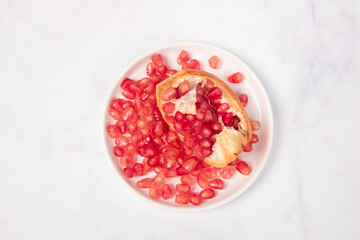 Fresh ripe pomegranate with clipping path on white background.