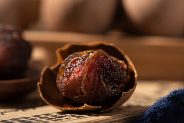 Dry Longan in a wood background