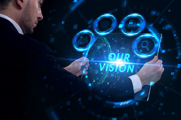 Business, Technology, Internet and network concept. Young businessman working on a virtual screen of the future and sees the inscription: Our vision