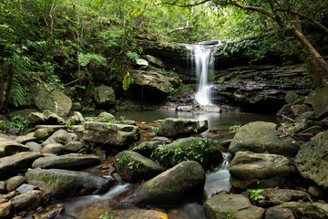 Kuura falls is a peaceful place to relax with its serene atmosphere and beautiful rocks  Iriomote Island, Yaeyama.