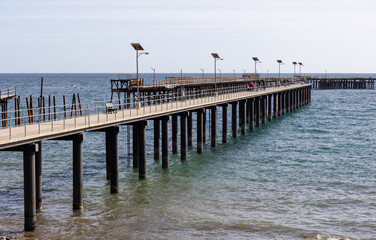 Fototapeta na wymiar The new and old Rapid Bay jetties on the Fleurieu Peninsula South Australia on April 12th 2021