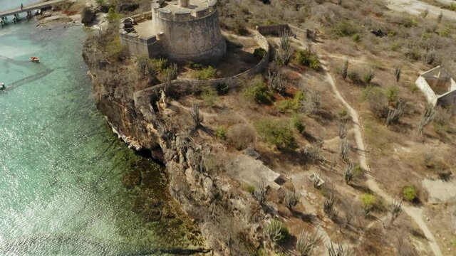 aerial drone image of Fort Beekenburg in Curaçao Caribean on the beach of Tug Boat