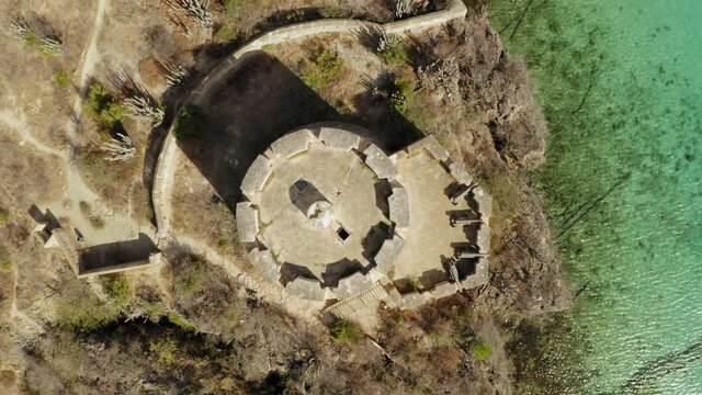aerial drone image of Fort Beekenburg in Cura&ccedil;ao Caribean on the beach of Tug Boat
