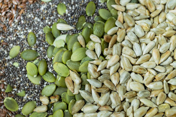 Macro topview of sunflower seeds, pumpkin seeds and chia