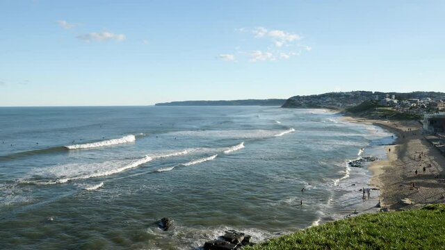pan of merewether beach and surf at newcastle in nsw, australia