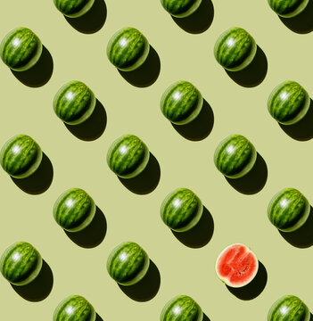 Fresh Watermelon design, with a single halved watermelon, on green background pattern