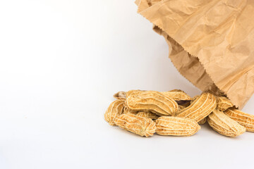Group of peanut with paper bag on white background,copy space.