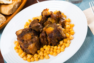 Oxtail stew with chickpeas - traditional Spanish dish. High quality photo