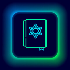 Glowing neon line Jewish torah book icon isolated on black background. Pentateuch of Moses. On the cover of the Bible is the image of the Star of David. Colorful outline concept. Vector