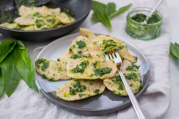 Pierogi ruskie, Baked dumplings stuffed with curd cheese and potatoes and wild garlic