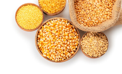 Different cereals and legumes on white background