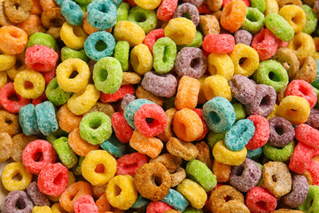 Fototapeta na wymiar Tasty cereal rings as background, closeup