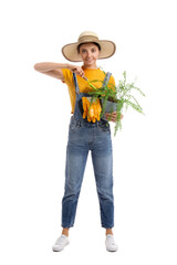 Young female gardener on white background