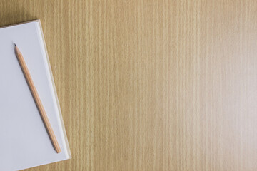 Working items with copy space on a wooden table