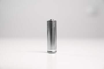 18650 Li-ion silver battery salt and alkaline GP R6 on a white background. disposable and...
