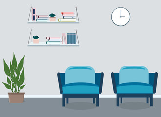 Presentation board for a business meeting next to an armchair and a potted plant