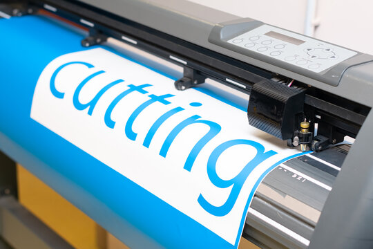 Cutting plotter close-up. The process of cutting a vinyl film