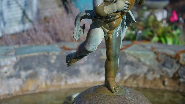 Bronze fountain sculpture Statue of a naked boy holding fish