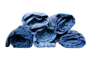 stack of rolls of blue jeans on white background isolate