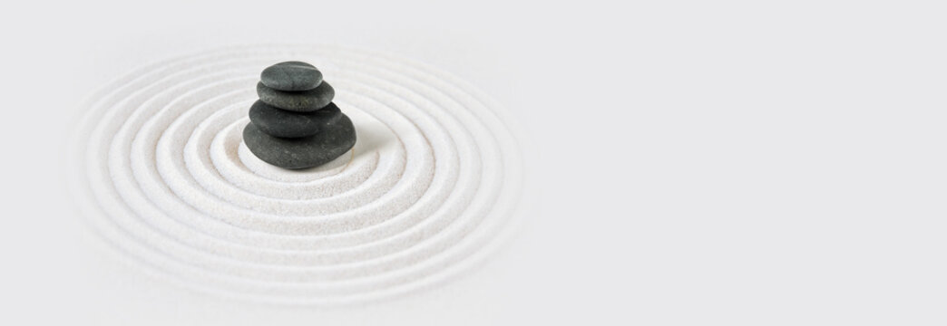 Zen japanese garden and black stones background. Horizontal banner