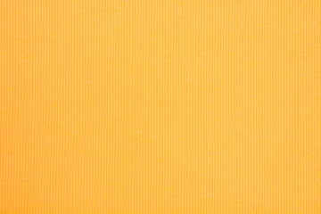 Fotobehang Yellow fabrics folded top view. Yellow textile  © fizke7