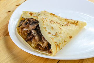 Pancake with mushroom and onion