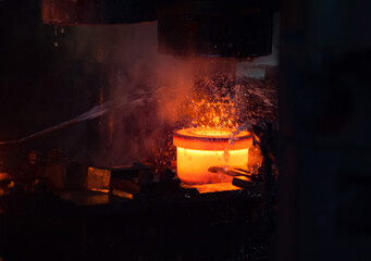Bearing plant. Stamping of the inner ring of the bearing on a mechanical press. Water cooling of...