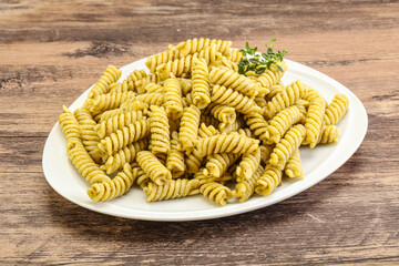 Italian pasta Fusilli with pesto