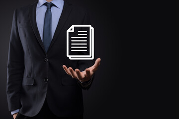 Businessman man holding a document icon in his hand Document Management Data System Business Internet Technology Concept. Corporate data management system DMS