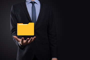 Businessman hold folder icon.Document Management System or DMS setup by IT consultant with modern computer are searching managing information and corporate files.Business processing,