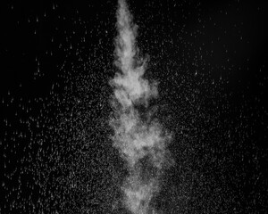 White steam and splashing water on a black background. Abstract background, design element